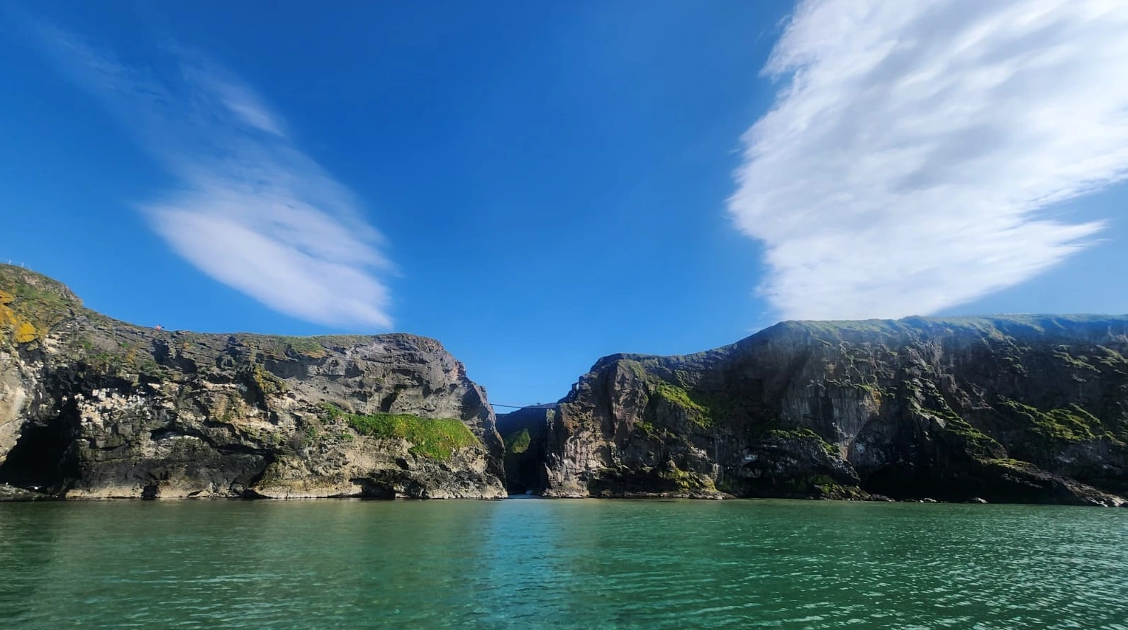 Carrick a red Island from a distance while on a sea safari